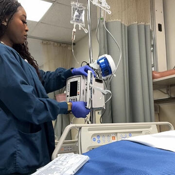Nursing student working in hospital.