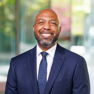 jamal anderson headshot in a suit