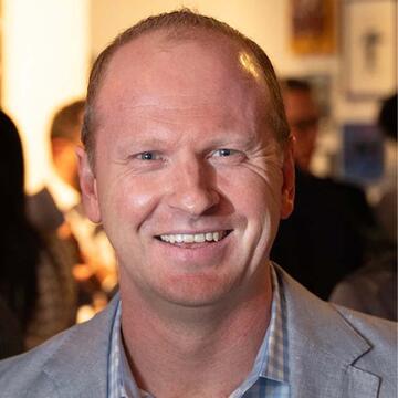 Jim Guthrie smiling headshot