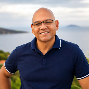 Keith Hunter Standing outside smiling