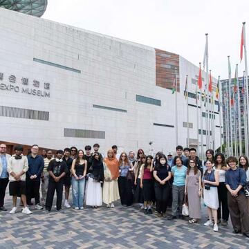 Theo Lavota-Robertson with USF students in Shanghai