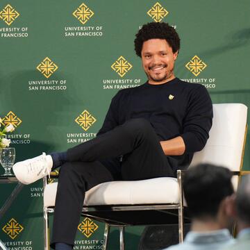 Trevor Noah on stage at the Silk Speaker Series