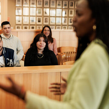 student speaks in moot court