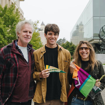 Lucas Carmody with his parents