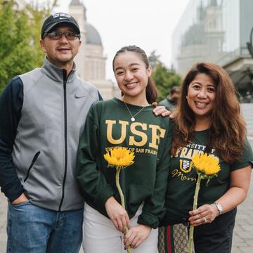 Megan Madlangbayan, center, with parents