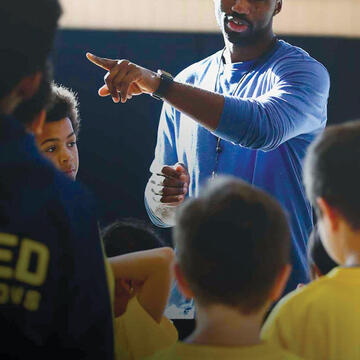 Jerome Gumbs coaching kids