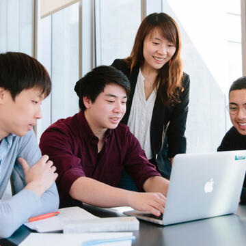 Students work on a project together