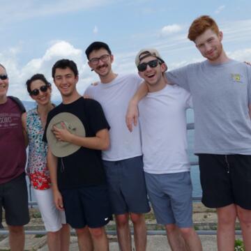 Group photo by the water