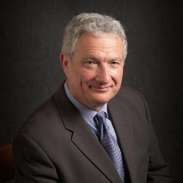 Prof. Max Neiman