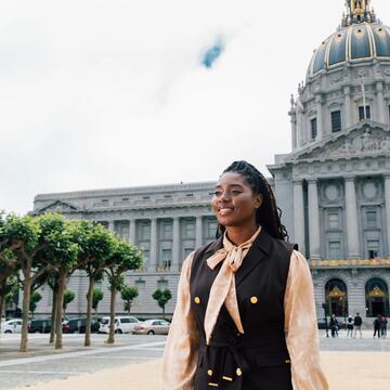 Tatiana Howard in front of San Francisco city hall