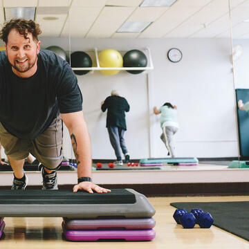 Christian Dillon in plank yoga pose