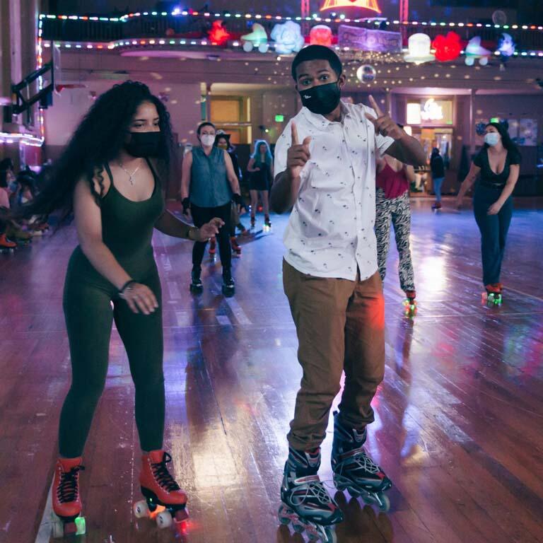 students rollerskating at the Church of the 8 Wheels