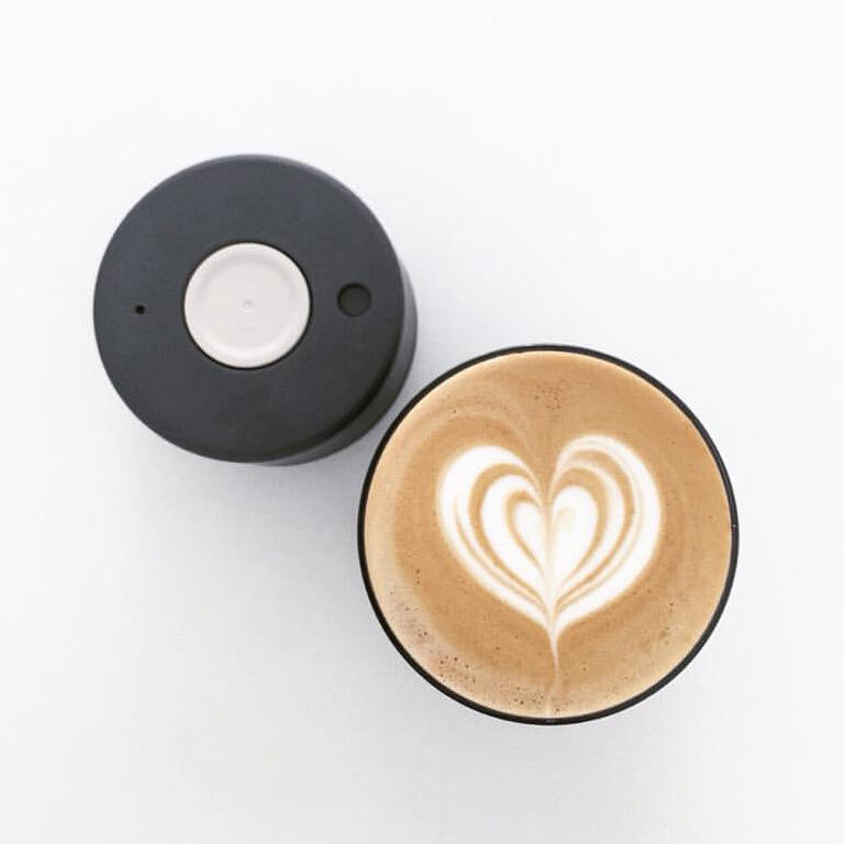 top down view of a latte with heart shaped foam