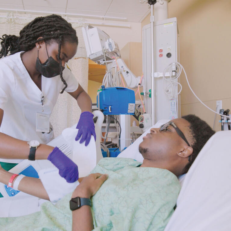 Nurse assisting a patient