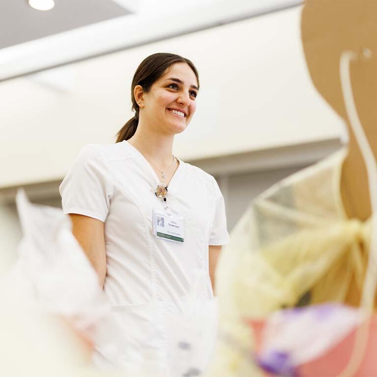 Nursing student in scrubs