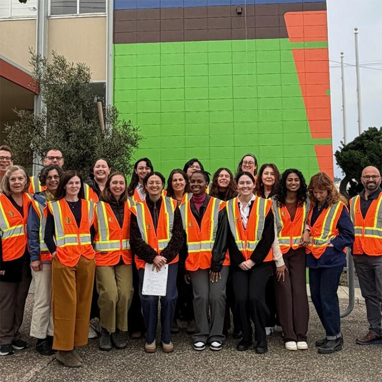 mccarthy center volunteers in orange vests