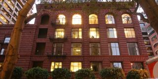 USF Downtown Campus with lights on.