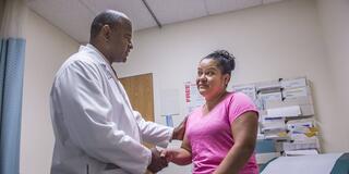 Doctor shaking a patient's hand