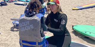 Adriana Guerrero-Nardone with girl at beach