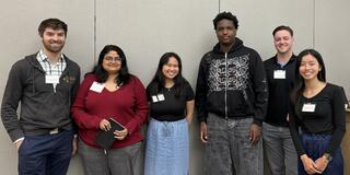 Students at USF AI symposium