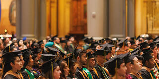 school of management graduates inside st.ignatius church