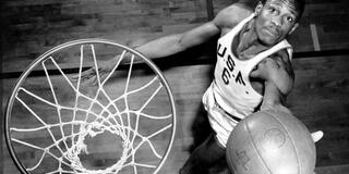 Top view of Bill Russell making a basket