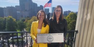 Tara August posing with Jeannine Russell
