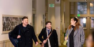 grad students walking and talking