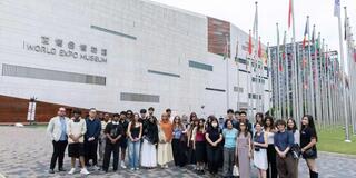 Theo Lavota-Robertson with USF students in Shanghai