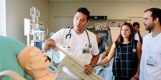 Nursing and health profession students in simulator lab