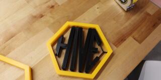  a hexagon with the word "Hive" in the middle