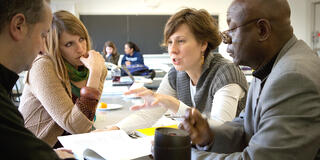 Graduate students during a discussion