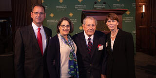 Donald L. Carano ’59 Alumnus of the Year Award winners (from left to right) Richard Saveri ’94, Guido Saveri ’50, and Lisa Saveri ’83, with Interim Dean Susan Freiwald (second from left)