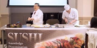 Sushi Knowledge Dissemination Course demo kitchen with two cooks