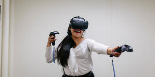 A student uses a virtual reality headset