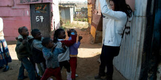 USF Student Kristen Dyer accompanies Alicia Keys in Africa to raise awareness about the AIDS epidemic