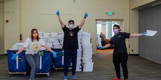 volunteers pack grad boxes