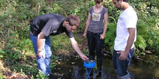 Students measure solar radiation in Marin County's Redwood Creek.