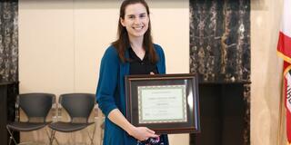 Ellen Pelos with MSBH Capstone award