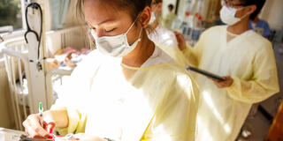 Nurses assisting patients