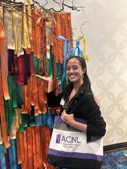 Student next to ribbons