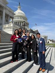 USF nursing students posing on steps in D.C.
