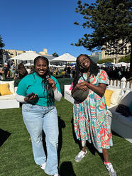 Advancement Communications Intern Daisha Bolden ’28 interviewing USF alumna