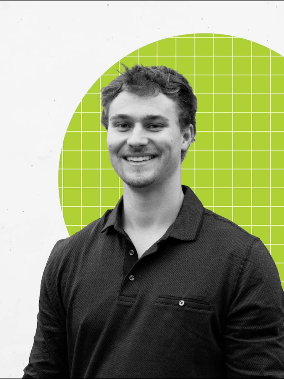 Zac Clark next to backpack created for unhoused people