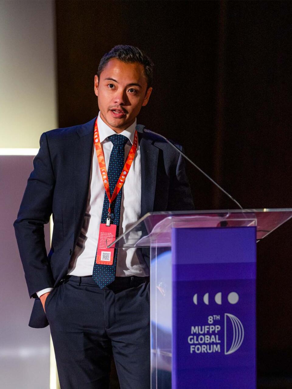 Felipe Dizons speaking at a podium